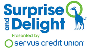 Surprise and Delight logo with a giraffe in solid blue with its head in the Servus logo
