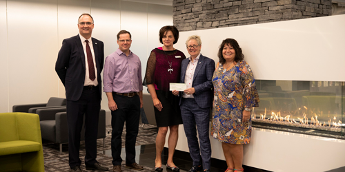 Mount Royal and Servus Credit Union employees gather in support of new partnership